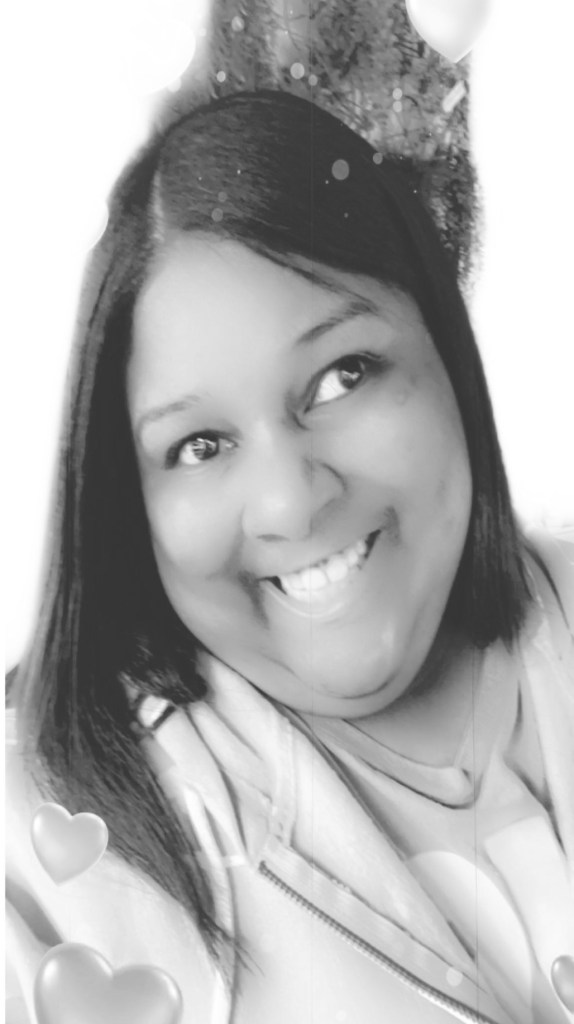 Image of Brittany, smiling beautifully into the canera