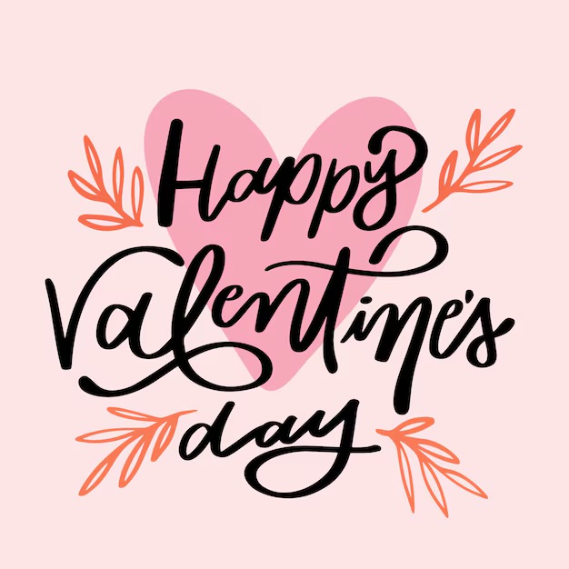 Image that says Hapy Valentine’s Day in cursive writing and small  florals at the top and bottom 