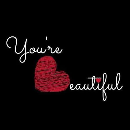 Image that reads, “You’re Beautiful”, in white, cursive writing. The “B” in beautiful is in the shape of a heart.